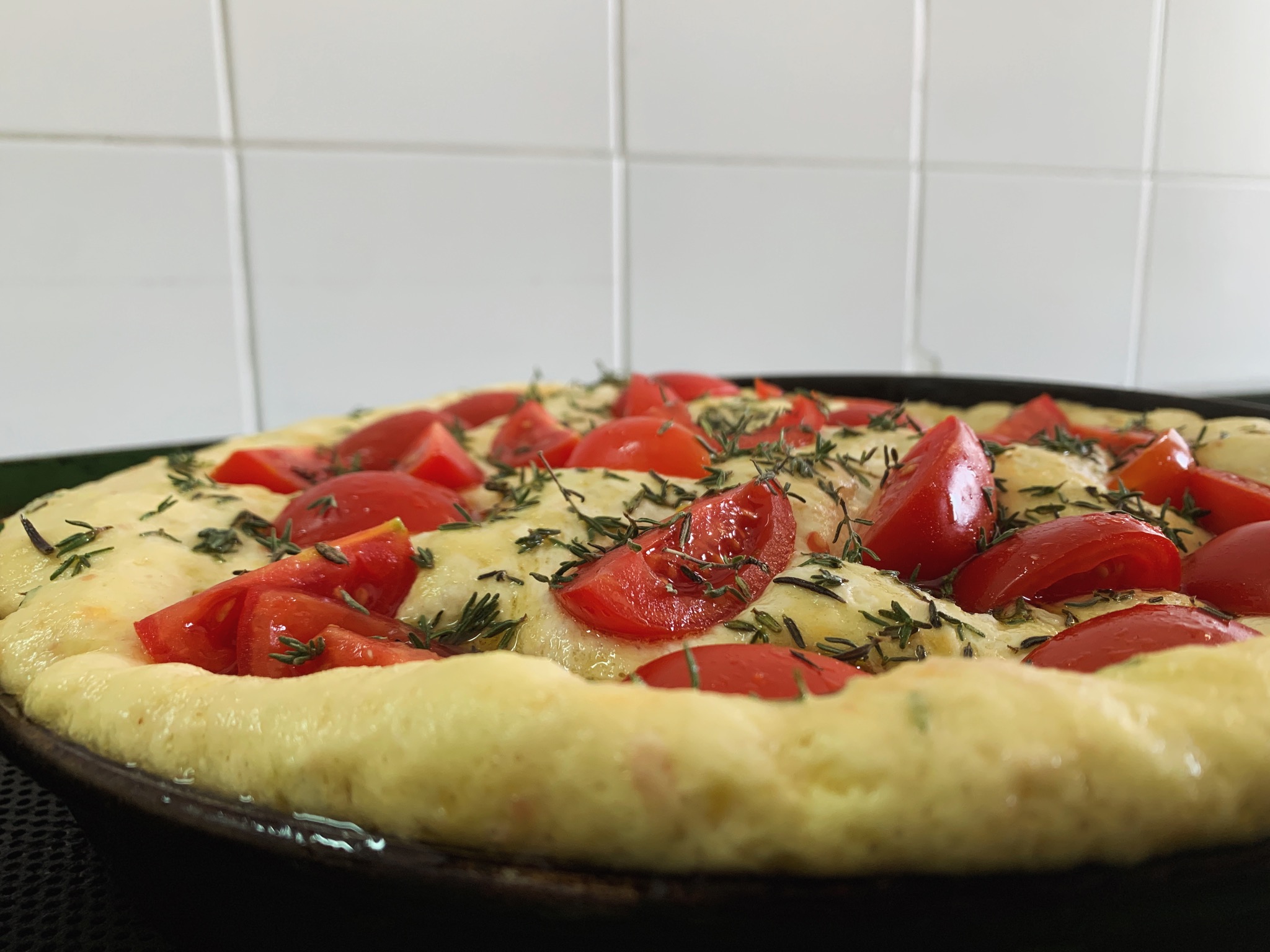 Focaccia with cherry tomatoes and rosemary
