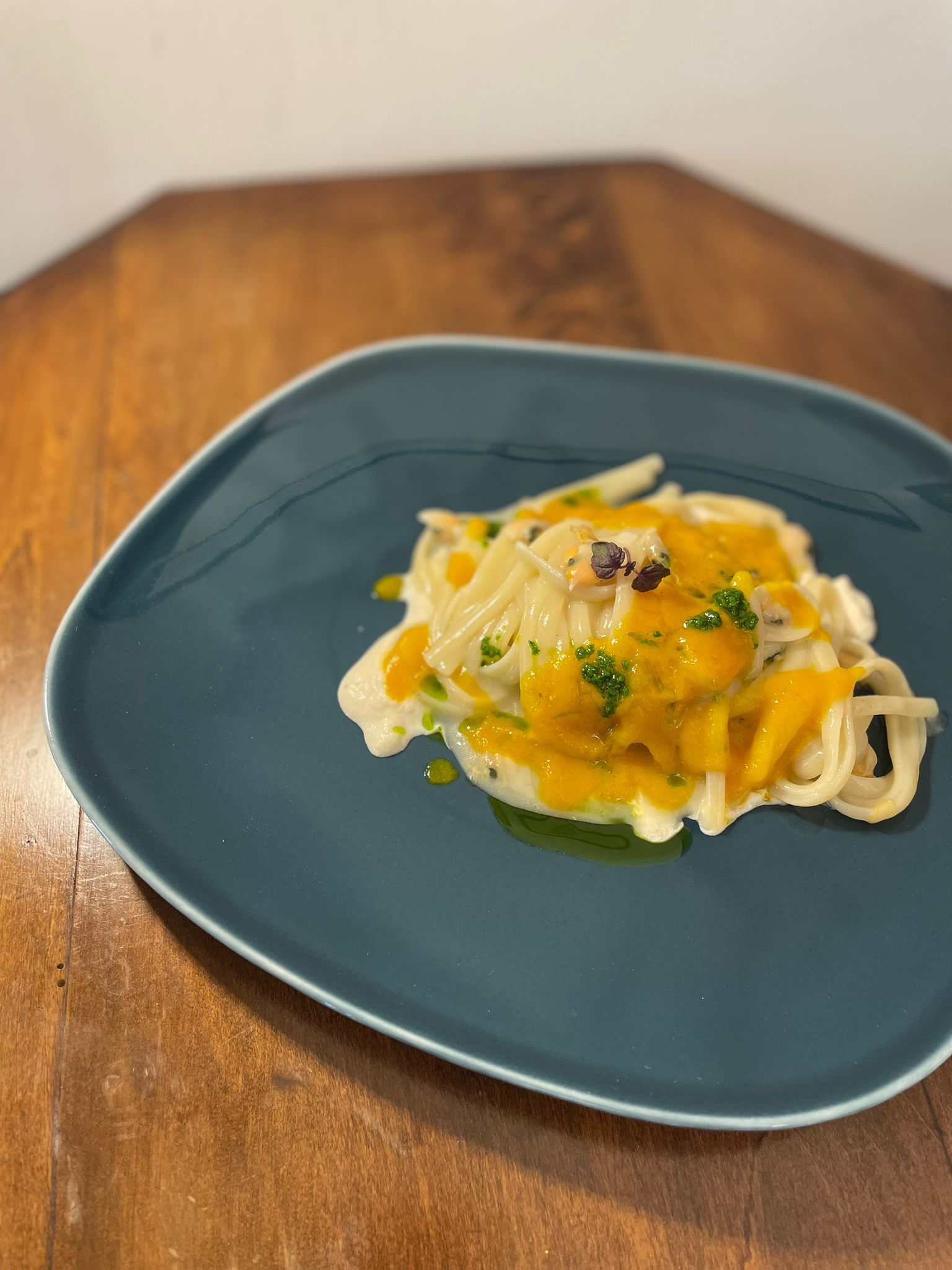 Pasta with pumpkin cream and herbs